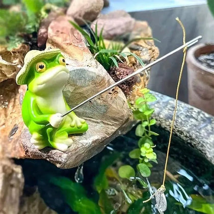 Generic charming resin frog fishing statue perched on a rock for outdoor garden decor.