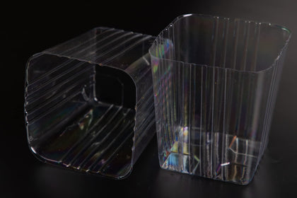 Generic clear plastic liner for 5-inch square planter protects surfaces from leaks.