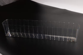Generic clear liner inside a wooden planter helps keep soil contained and surfaces clean
