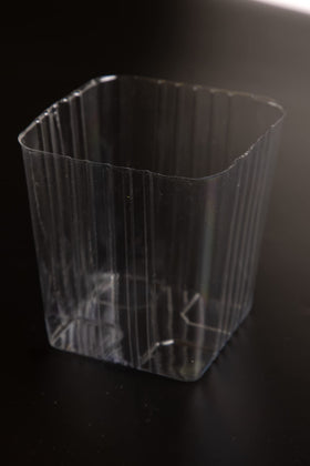 Inside view shows the Generic Clear Plastic Liner inserted inside a wood planter.