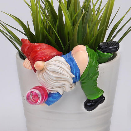 Generic cute climbing gnome figurine perched on a flower pot hugger for outdoor charm.