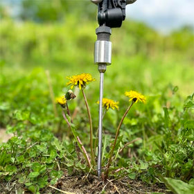 Generic Dandelion Weeder Tool attachment on pump sprayer facilitates targeted root injection.