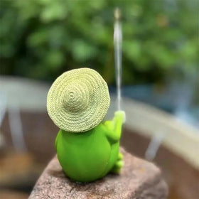 Generic detailed resin frog with vibrant colors enhances garden ambience.