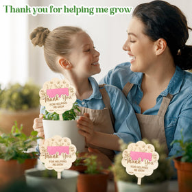 Generic handcrafted teacher gift stake enhances green spaces.