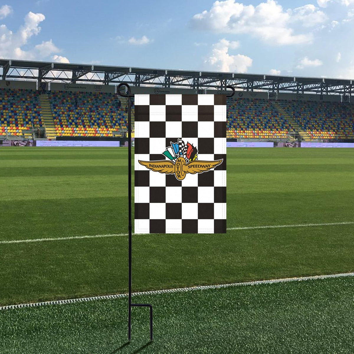 Durable polyester flag shown outdoors for garden or yard display.