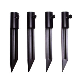 Generic metal stake with tiki-torch base anchors outdoor lighting securely.