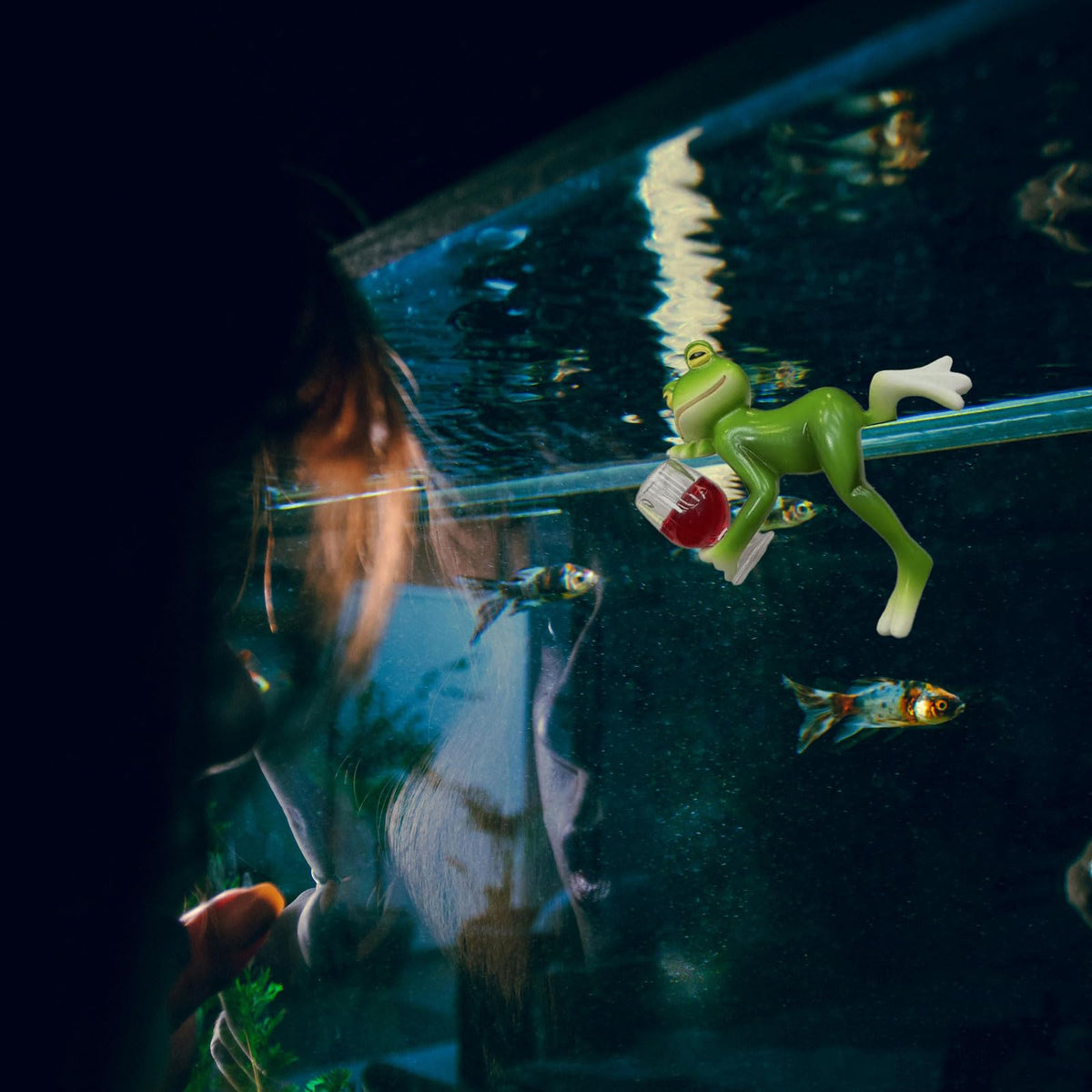 Generic miniature frog figurine fish tank decor brightens aquatic displays.