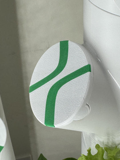Generic MyGardyn Cap with black lining improves light control for cleaner indoor hydroponics.