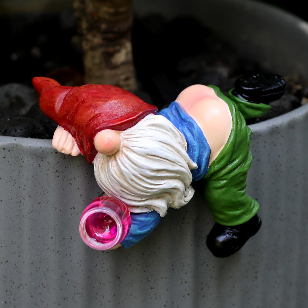 Generic resin hanging gnome statue used as durable outdoor decor.