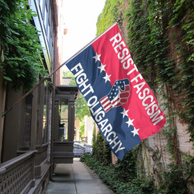 Generic Resist Fascism flag placed in a yard during an event
