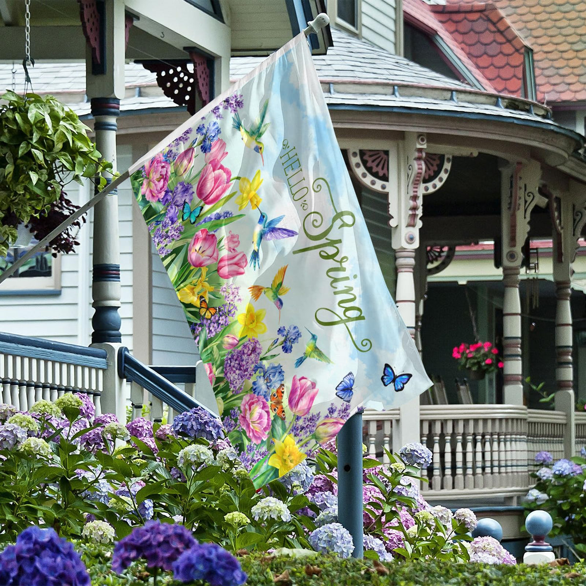 Generic Hello Spring garden flag warmly welcomes guests on your deck.