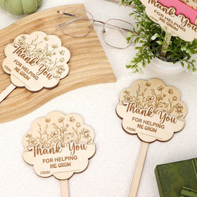 Generic 10-pack teacher appreciation stakes decorate desks and planters.