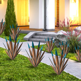 Generic Tequila Rustic Sculpture blue highlighted agave adds vibrant outdoor focal point.