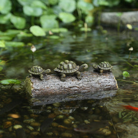 Generic three-turtle figures on log suit aquariums, terrariums, or fairy gardens.