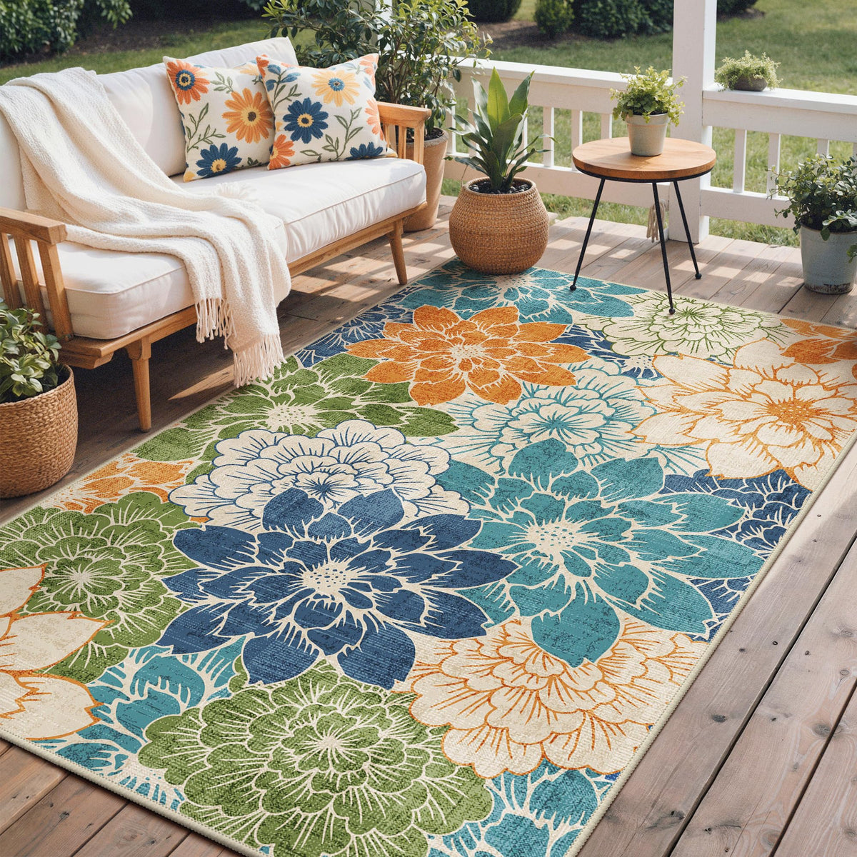GENIMO floral-pattern rug in teal blue for patios and living rooms.