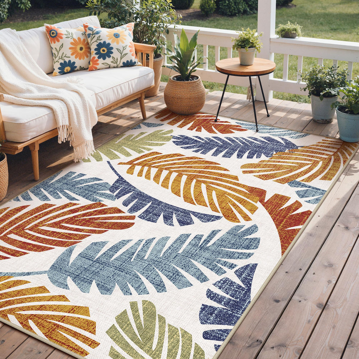 GENIMO leaf-pattern rug for outdoor and indoor spaces with durable, weather-ready design.