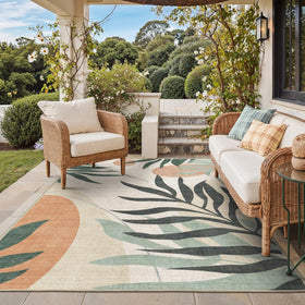 Genimo leaf-pattern rug 9x12 enhances patio decor with stylish outdoor charm.