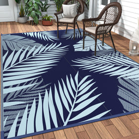 GENIMO outdoor rug with navy palm leaf pattern ideal for patio decor and easy care