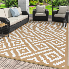 GENIMO outdoor rug 6x9 on brown-white patio for durable weatherproof use.