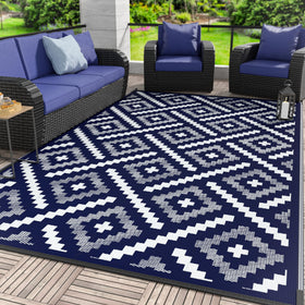 GENIMO outdoor rug 6x9 on patio display for durable outdoor use.