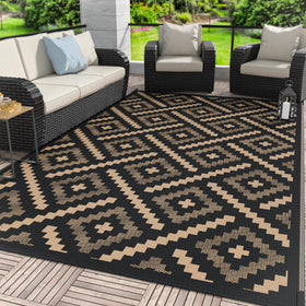 GENIMO Outdoor Rug 6x9 on patio demonstrates extended lifespan with dual patterns for flexible outdoor styling.