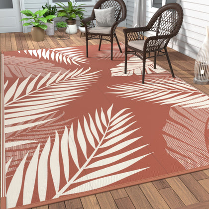 GENIMO outdoor rug palm leaf pattern in brick red, ideal for patio decor.