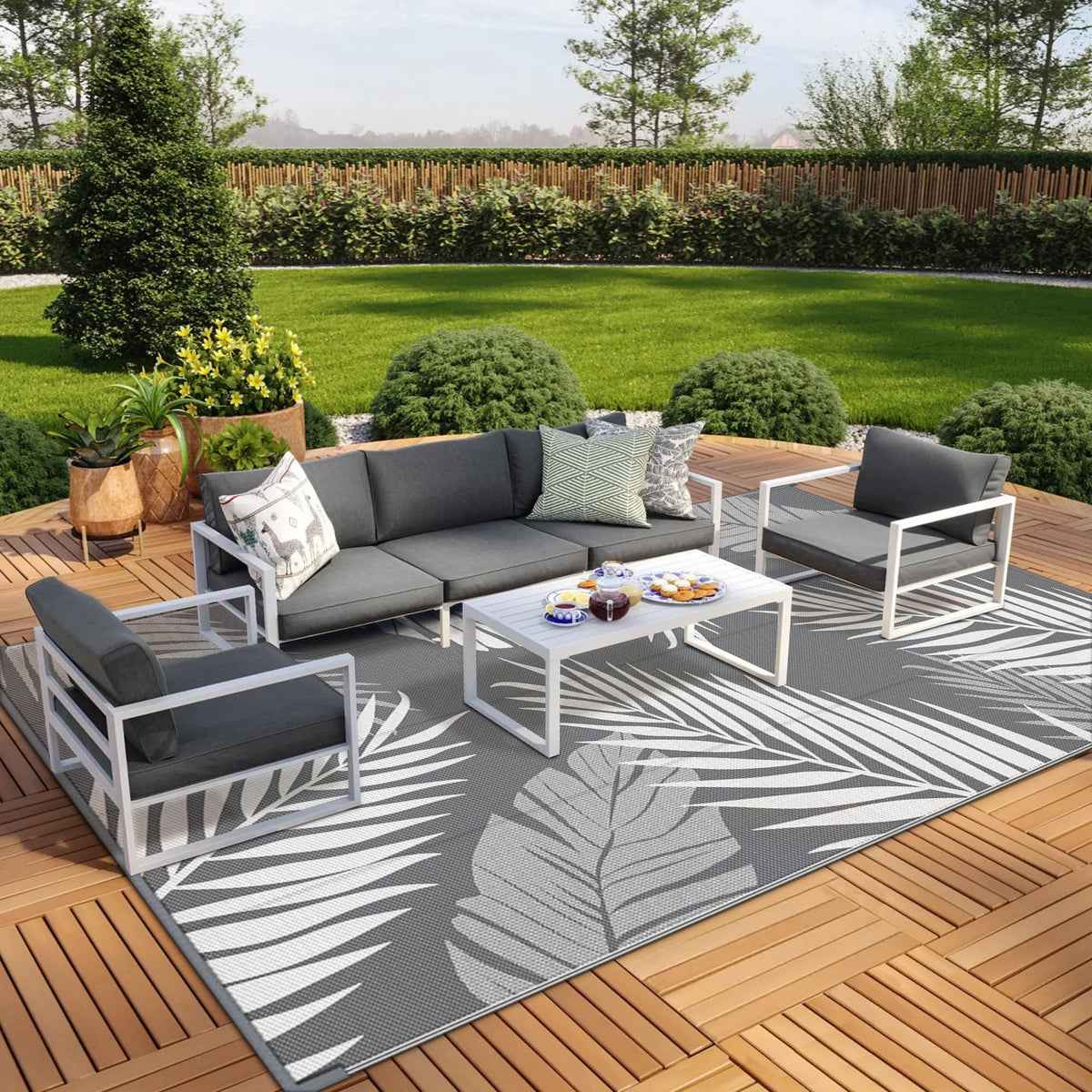 GENIMO outdoor rug folds into its carry bag for simple RV trips.