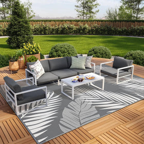 GENIMO outdoor rug folds into its carry bag for simple RV trips.