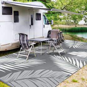 GENIMO rug features four corner loops and stakes to secure on windier days.