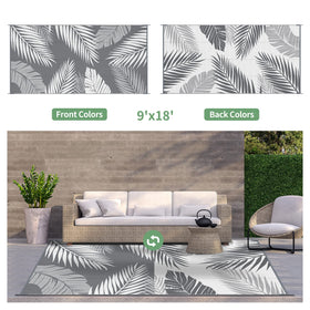 GENIMO 9x18 grey and white reversible pattern complements any exterior space.