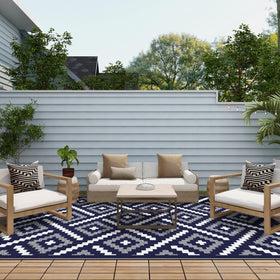 GENIMO outdoor rug on balcony or deck, weatherproof and stain resistant.