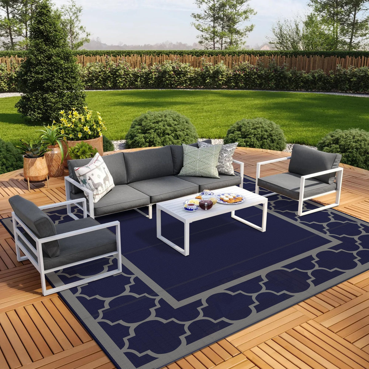 GENIMO outdoor rug in blue and grey on a patio for durable outdoor style