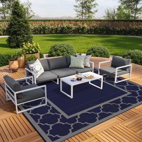 GENIMO outdoor rug in blue and grey on a patio for durable outdoor style