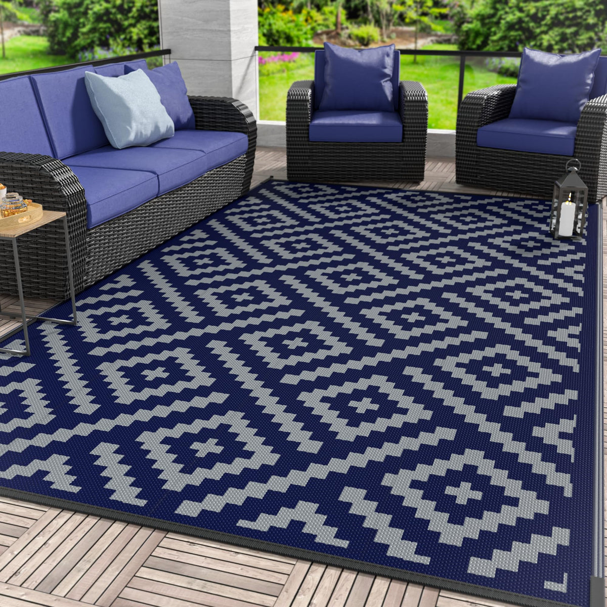 GENIMO outdoor rug in blue-grey on patio shows weatherproof, easy-clean performance for outdoor gatherings.