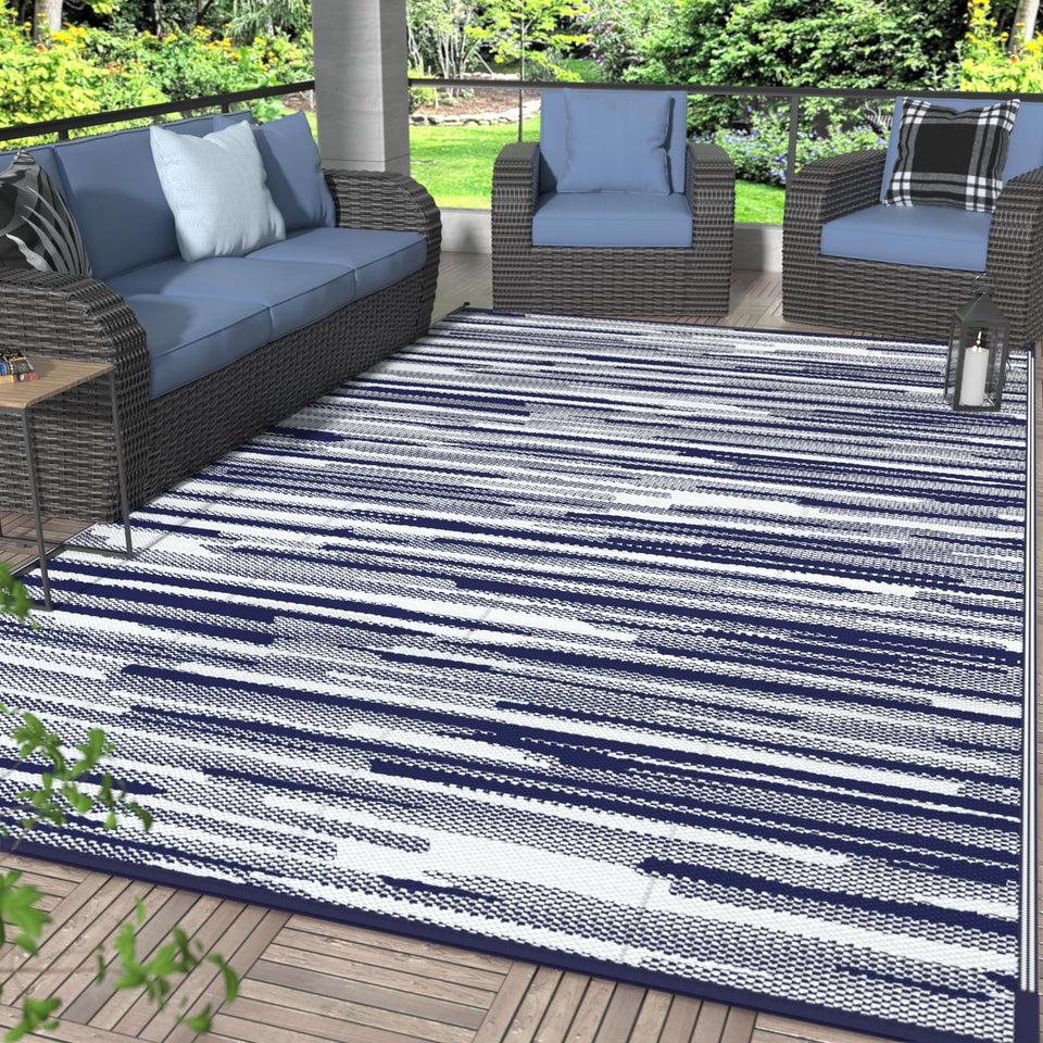 GENIMO outdoor rug in blue and white for patio use, waterproof and easy to clean.