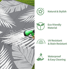 GENIMO Outdoor Rug has corner loops and stakes to secure it outdoors