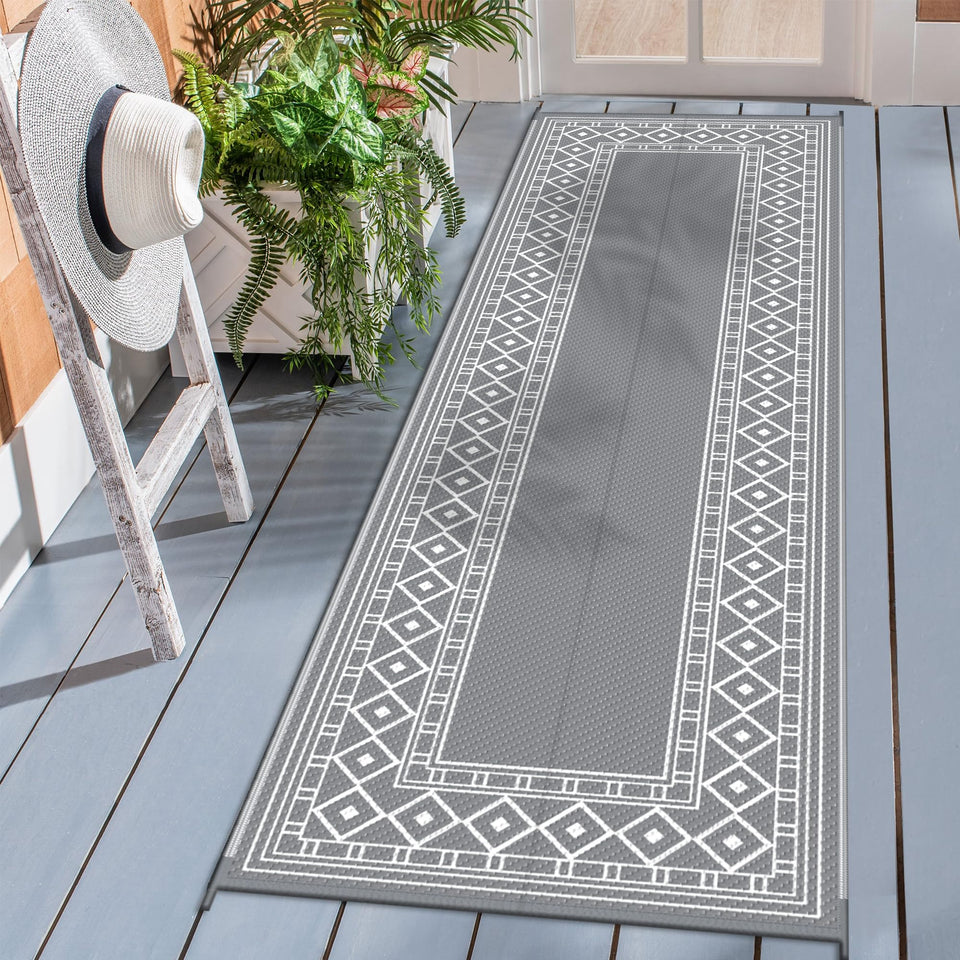 GENIMO outdoor rug with diamond-frame design enhances patio style