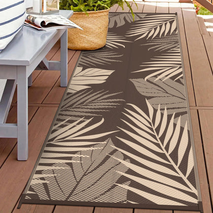 GENIMO outdoor rug: double-sided palm leaf pattern for versatile patio styling.