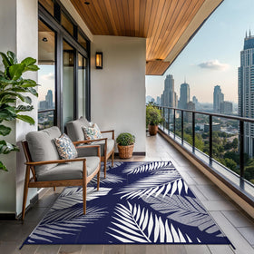 GENIMO rug features four corner loops and stakes for secure setup.