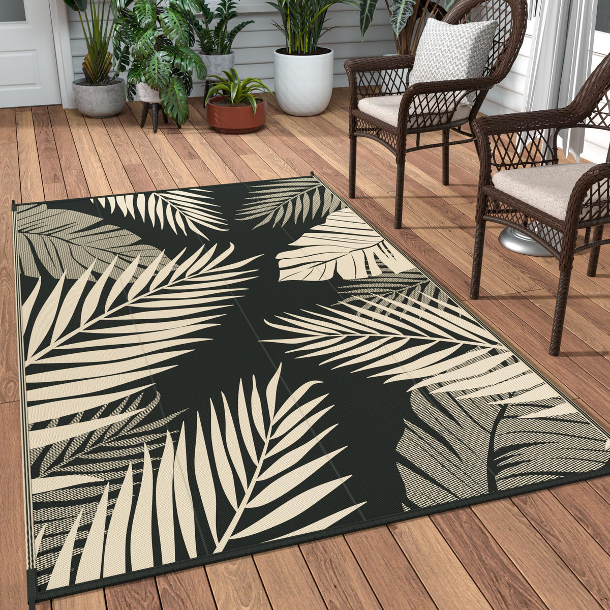 GENIMO outdoor rug with palm leaf design, ideal for patios and balconies.