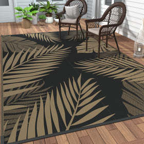 GENIMO outdoor rug with palm leaf design, ideal for patios and beach picnics