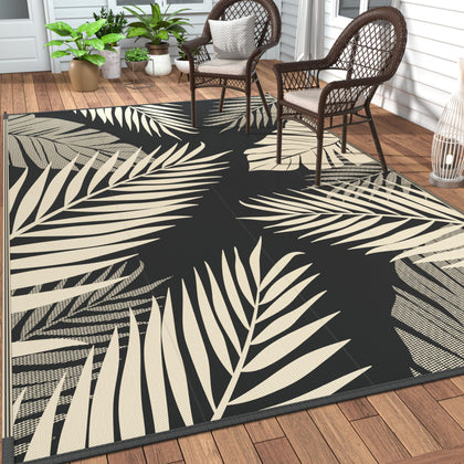 GENIMO palm-design outdoor rug, double-sided for versatile patio and beach setups.