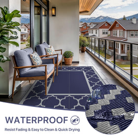 GENIMO rug complements patio furniture with its timeless blue accents.