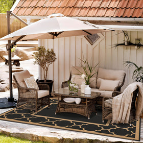 GENIMO outdoor rug with central surface for table or camping setup.