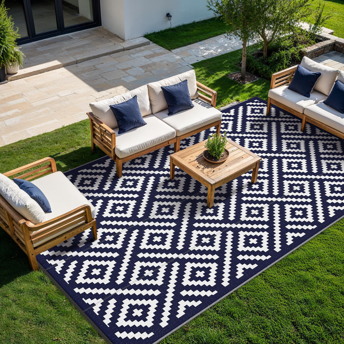 GENIMO outdoor rug with reversible pattern design for versatile outdoor use.