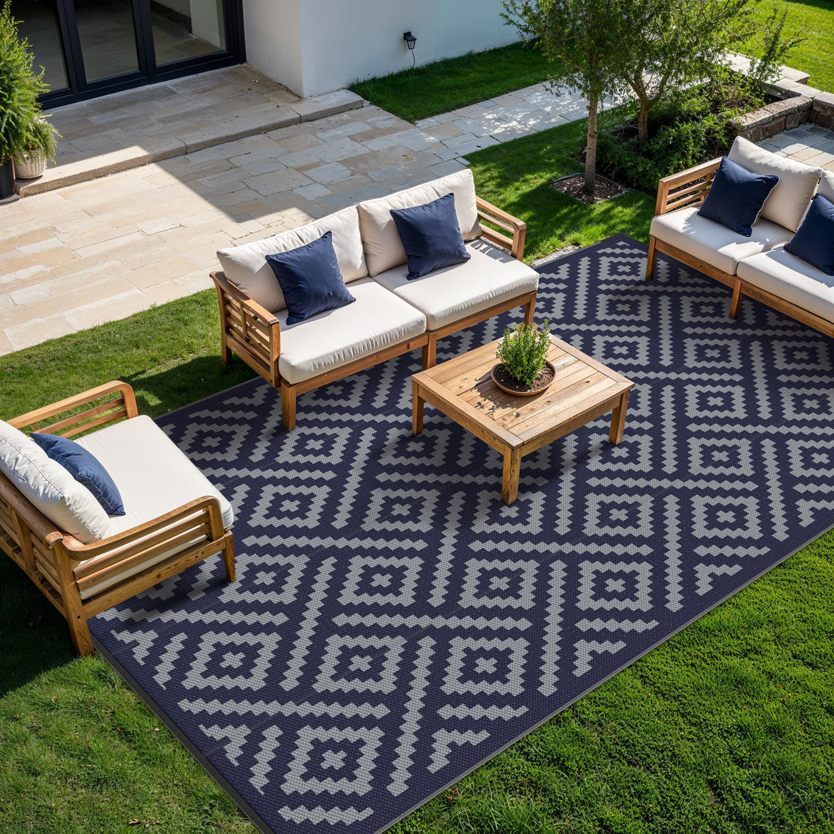 GENIMO outdoor rug with reversible geometric patterns doubles use in any space.