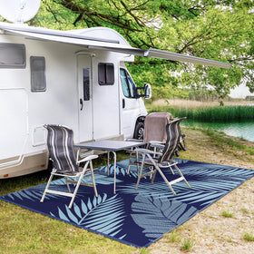 GENIMO rug includes corner stakes to secure on windy decks