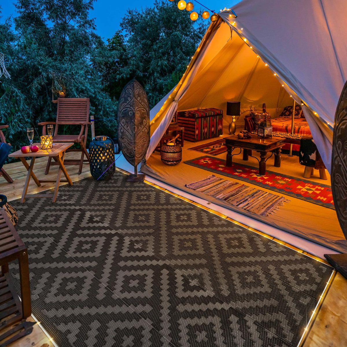 GENIMO outdoor rug laid on patio showing quick-clean, weather-ready versatility.
