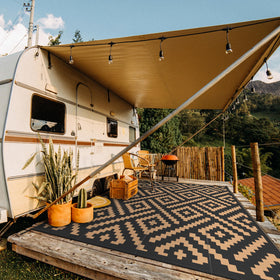 GENIMO lightweight outdoor rug folds compactly for easy RV trips.