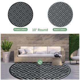 GENIMO reversible geometric-pattern outdoor rug for balcony or deck.